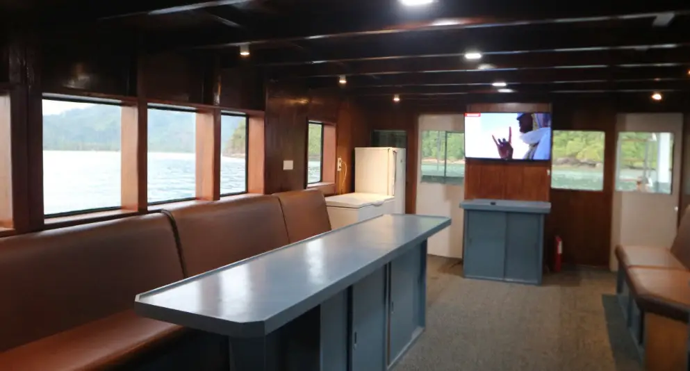 Saloon table with sea views through the windows