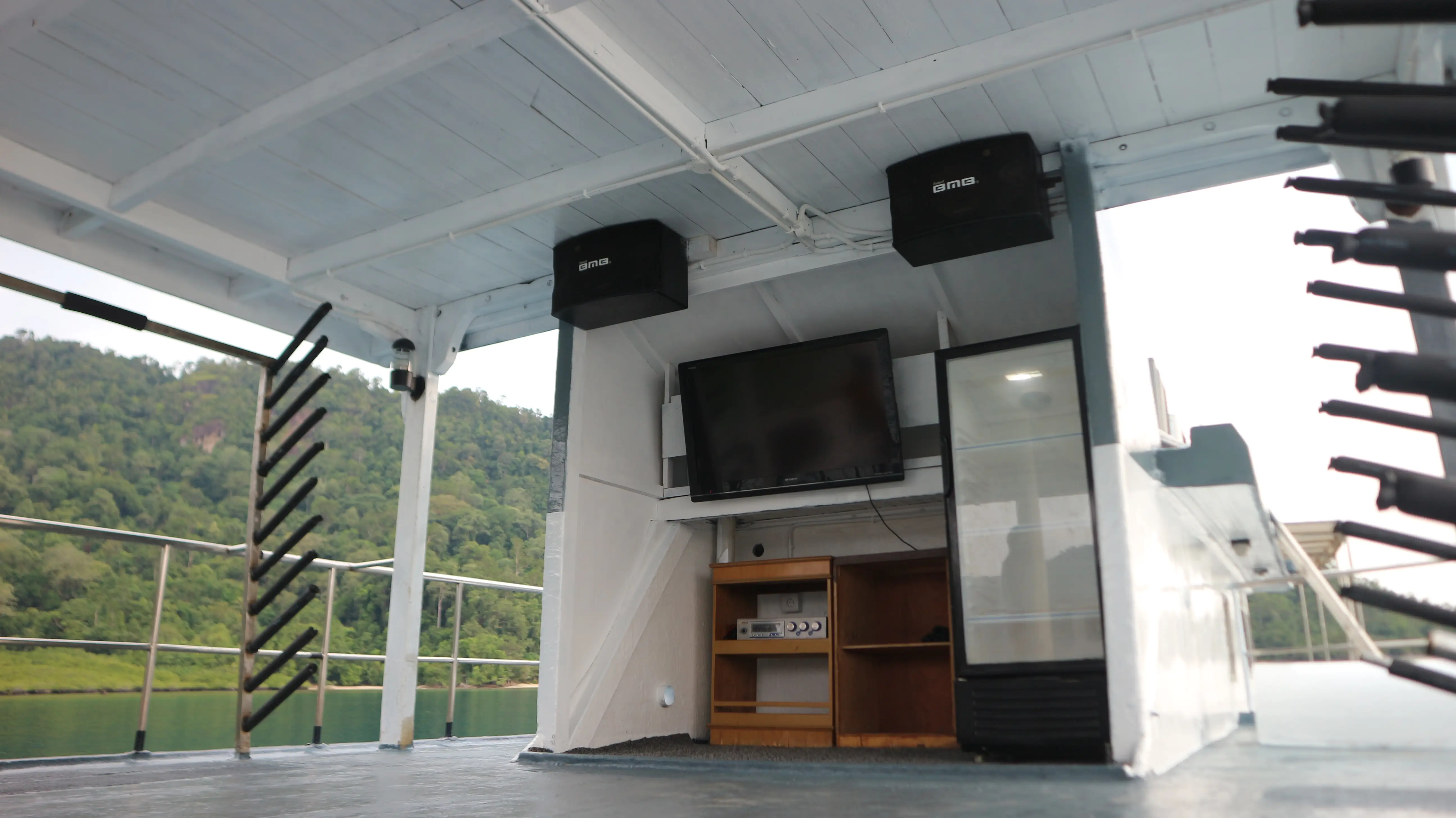 Upper deck lounge with TV and drinks fridge
